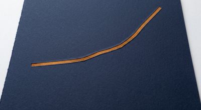A single amber line rising steeply from lower left to upper right, pressed into navy paper with nothing else on the surface.